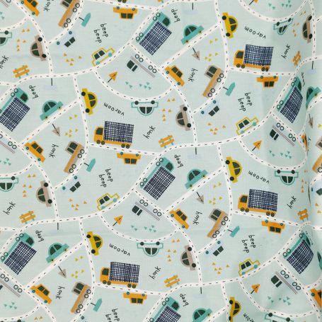 Motif de tissu représentant des véhicules et des routes sur fond bleu clair.