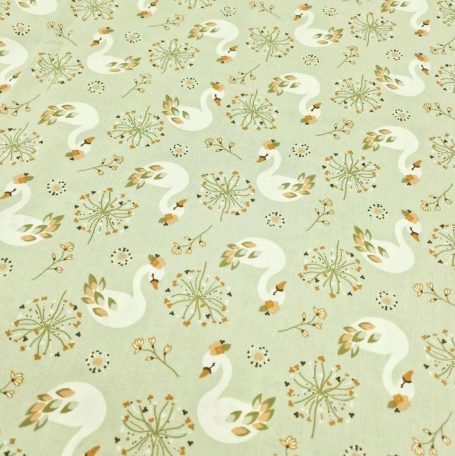 Motif floral avec des cygnes sur fond vert pâle.