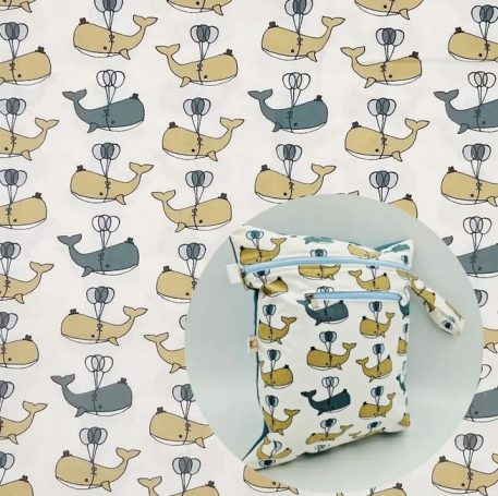Tissu à motifs de baleines jaunes et bleues sur fond clair ballons