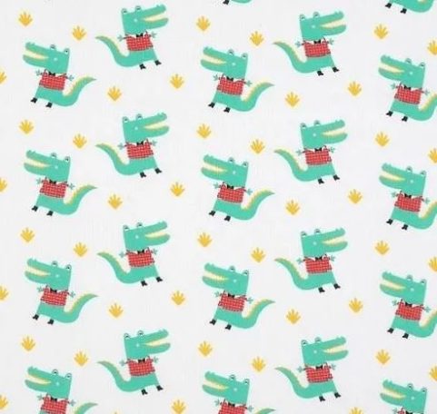 Motif répétitif de petits crocodiles verts portant un gilet rouge sur fond blanc.